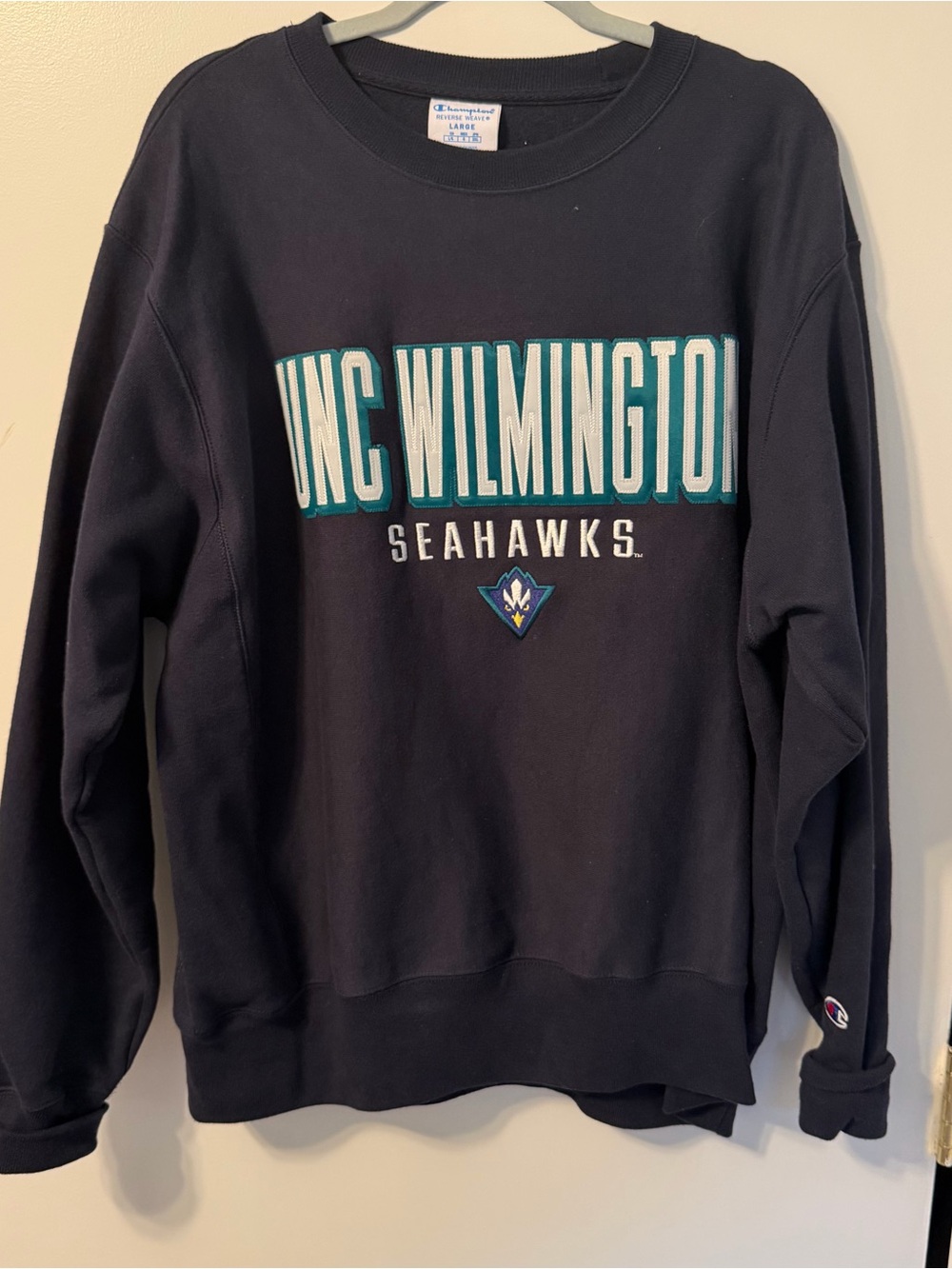 Champion Navy Sweatshirt with Teal and White UNC Wilmington Lettering
